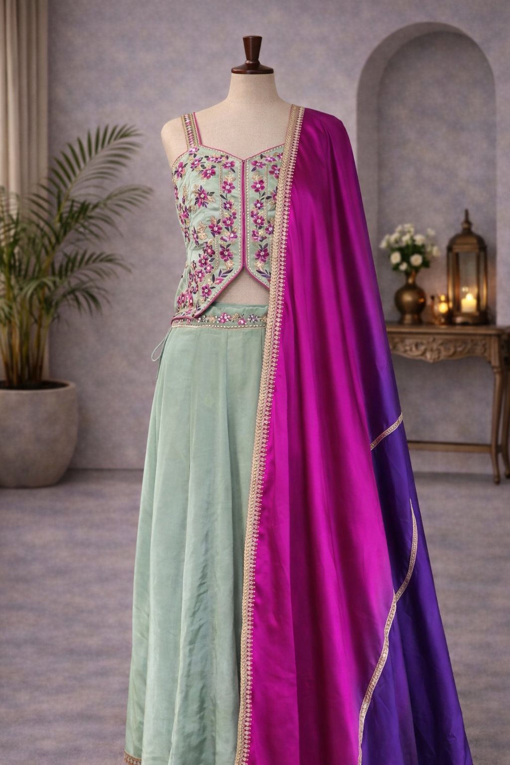 Green color tissue lehenga with purple raani satin dupatta