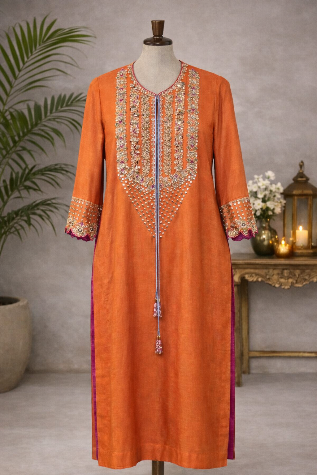 Orange moonga silk kurta with heavy dori madori work