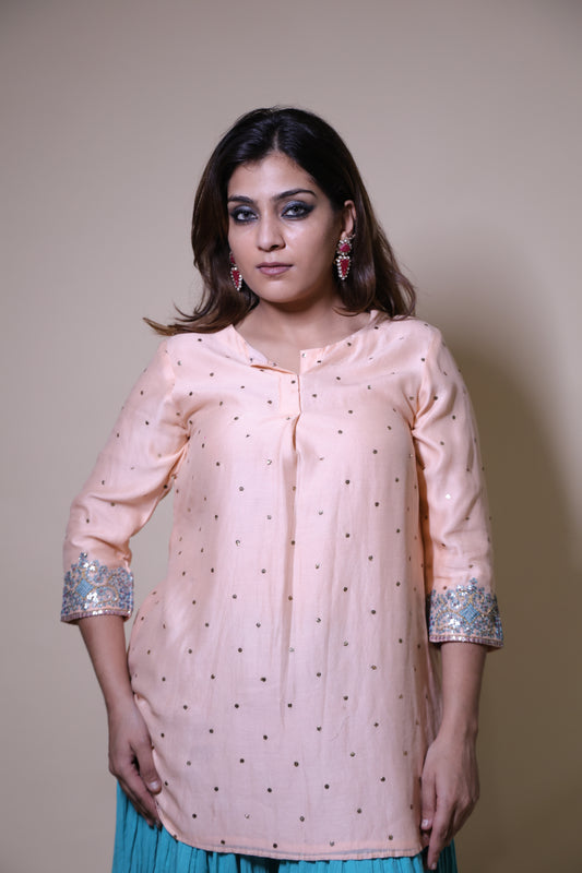 Peach mukaish short kurta with crushed skirt with gotta patti work