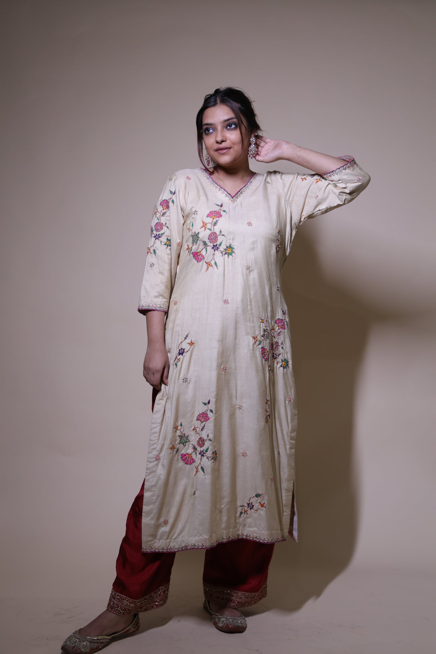 Beige handpainted floral kurta with silk pallazzo suit with intricate dori & beads handwork