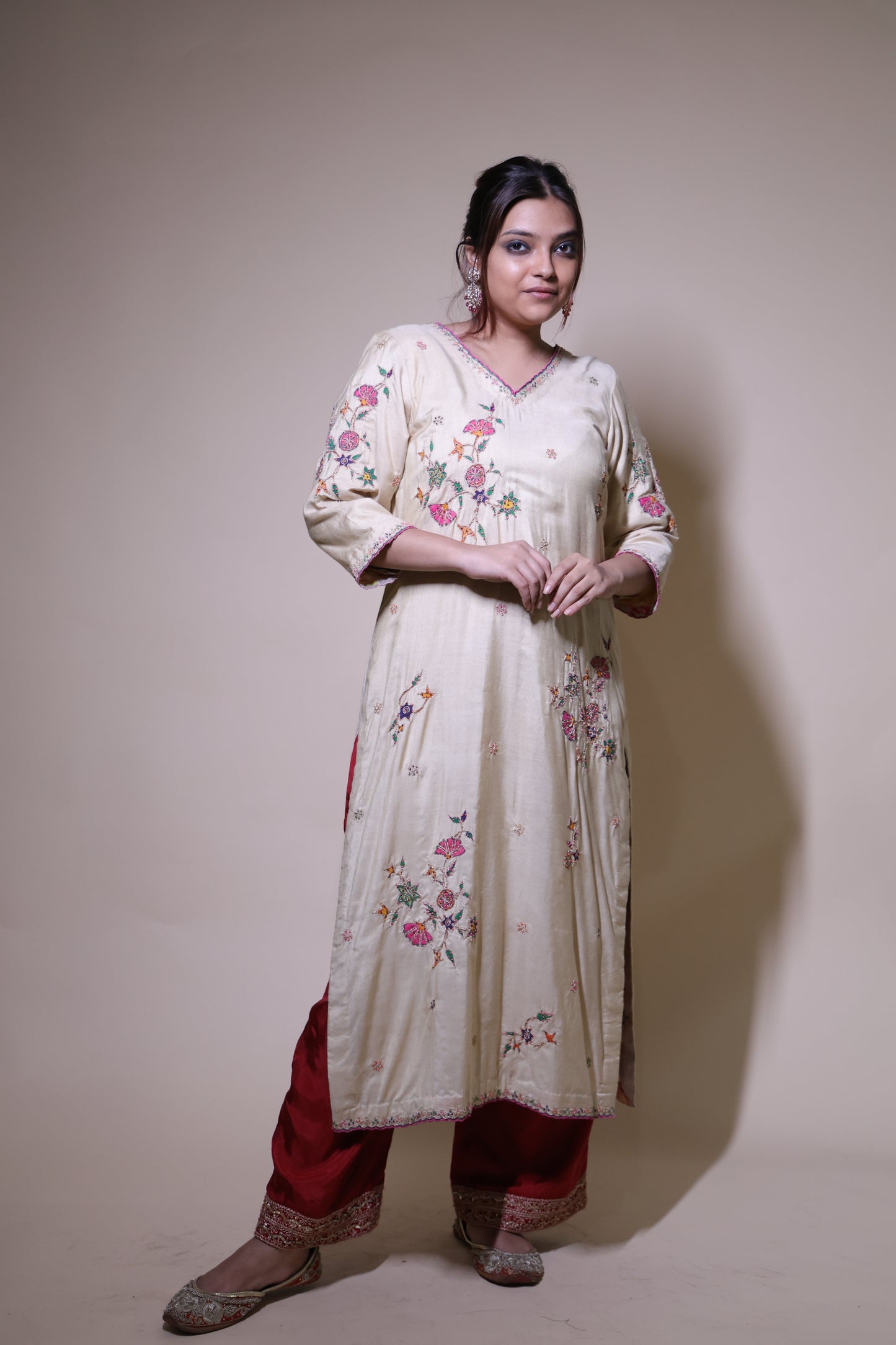 Beige handpainted floral kurta with silk pallazzo suit with intricate dori & beads handwork