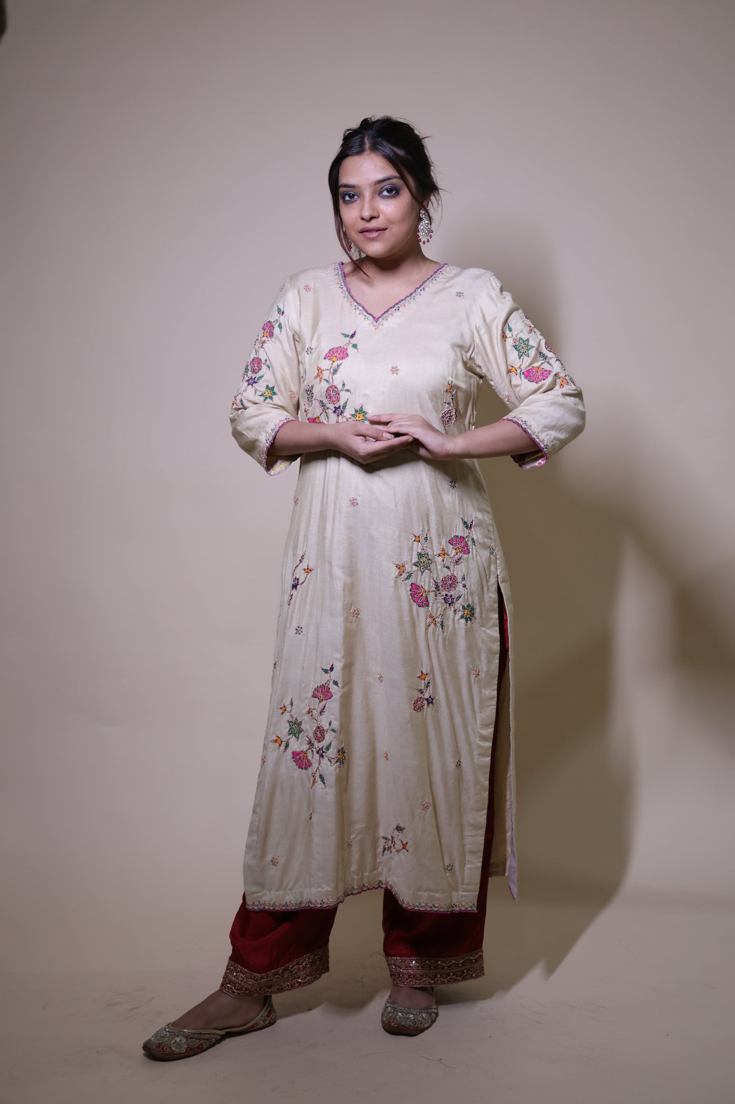 Beige handpainted floral kurta with silk pallazzo suit with intricate dori & beads handwork