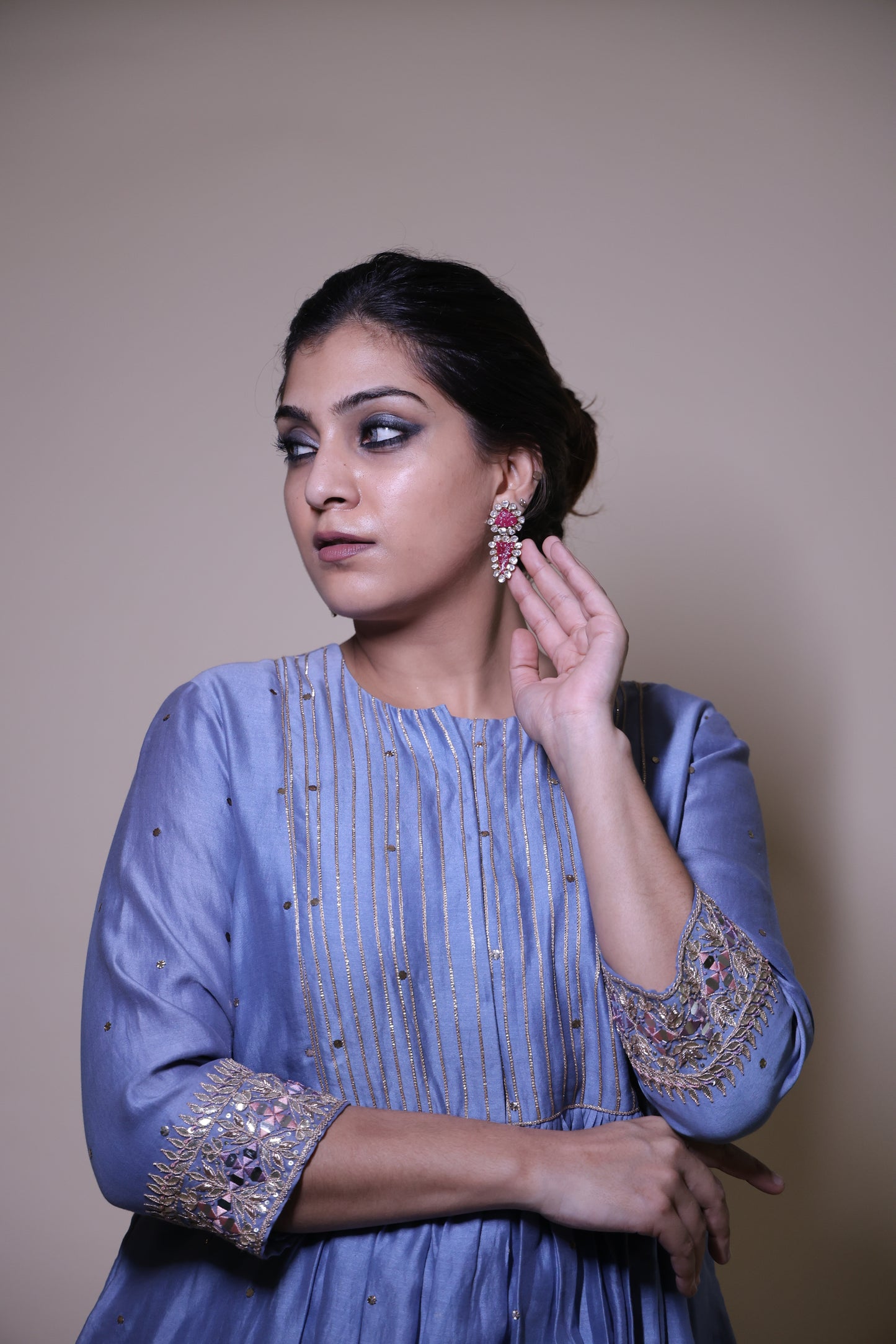 Blue mukaish short kurta with  cream tissue pants